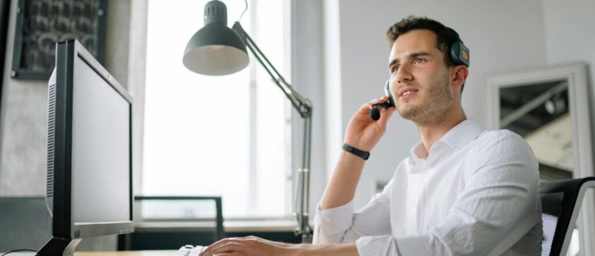 a man working in a call center